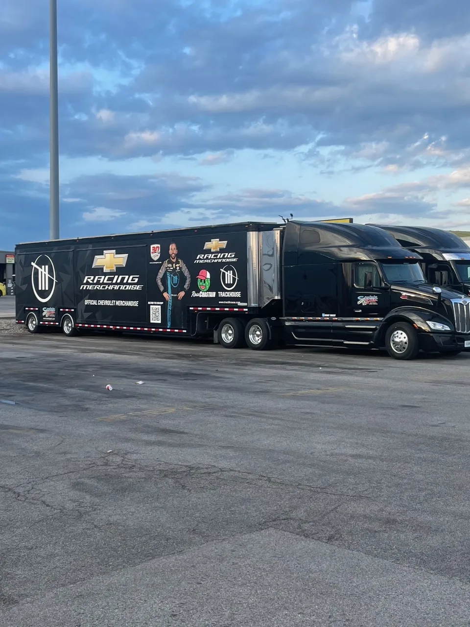 The merch haulers parked in the Pilot lot