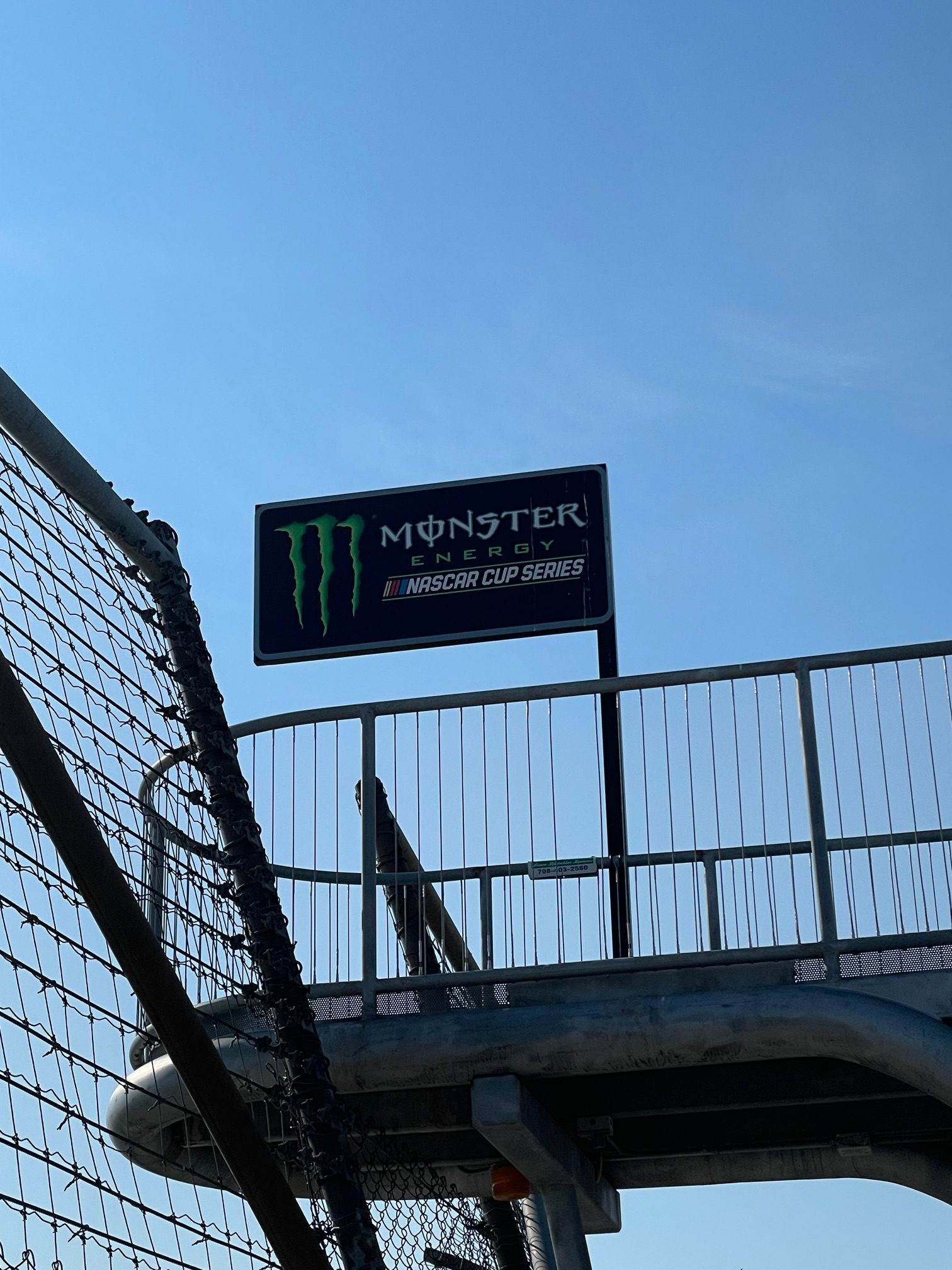 The old Monster Energy Cup Series sign still atop the flag stand at Chicagoland Speedway